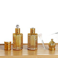 Arabia Dubai Wholesale 6ml Cylindrical Glass Perfume Bottle Car Ornament Round Gold Attar Oil Essential Oil Bottle