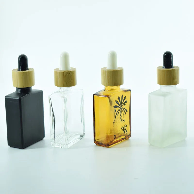Hot Sell Frosted Black Square Glass Dropper Bottle for Essential Oil with Black and Bamboo Lid 15-100ml
