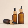 Luxury Amber Frosted Glass Bottle Empty 30ml 50ml Refill Bamboo Lid Round Shoulder Glass Skincare Essential Oil Dropper Bottle