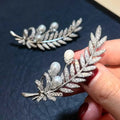 Elegant Ye Yu Luxury Brass Brooch with 6-7mm Natural White Freshwater Feather Shaped Pearl for Women Men