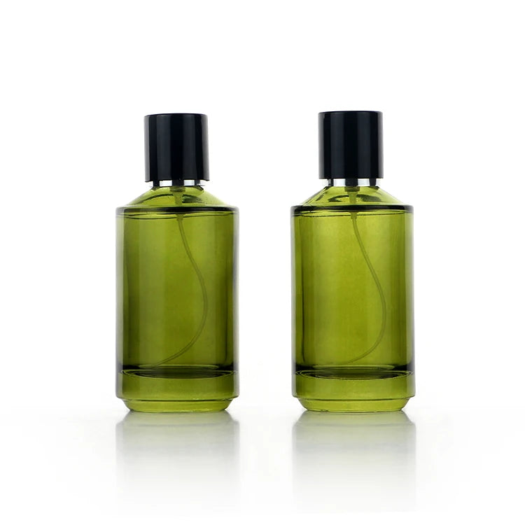 High End ury 100ml clear Empty Oliver Green Perfume Bottle with Special Shoulder Design Fragrance Mist Sprayer