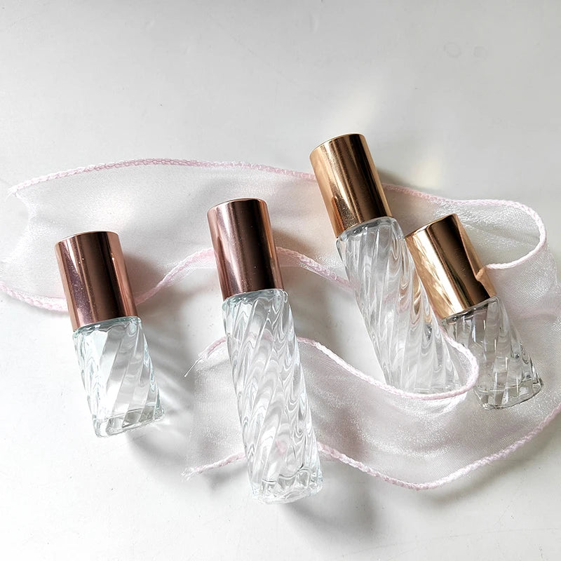 Essential Oils Roll on Bottle Swirl Shaped 5ml 10ml clear Glass Bottle with Metal Roller Glass Roller Shiny Rose Gold Cap