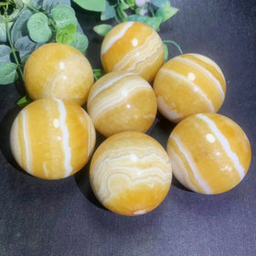 Wholesale Nature Crystal Yellow Calcite With Phantom Polished Sphere Ball for Sale