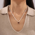 New Style Heart-shaped Zircon Pendant Necklace Titanium Steel Gold-plated Imitation Pearl Design Light Luxury Clavicle