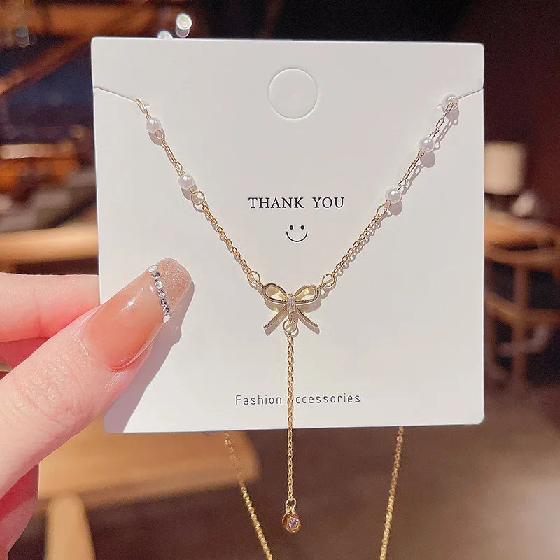 Ins 18K Gold Plated Stainless Steel Bow Knot Choker Necklace Titanium Steel Baroque Pearl Butterfly Tassel Necklace for Women