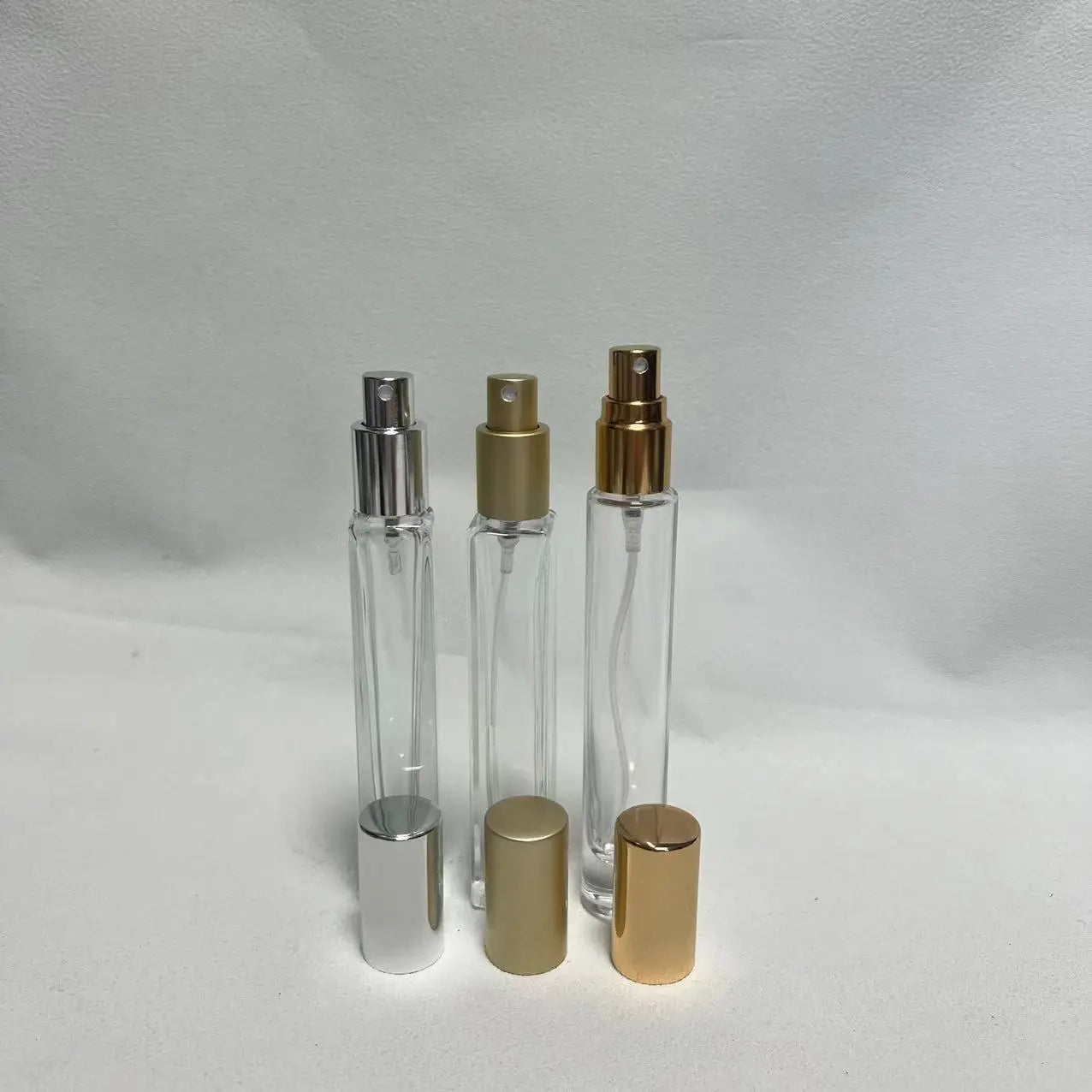 OEM Custom Luxury 10ml 15ml Refillable Empty Perfume Glass Bottle with Pump Sprayer for use in Nail Polish Oil Facial Cleanser
