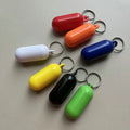 Factory Wholesale Custom Logo Capsule Shape Keychain Float Plastic ABS Floating Key Chains