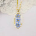 Classic Forget Me Not Pressed Flower Gold Plated Necklace Epoxy Resin Flower Oval Pendant Necklace