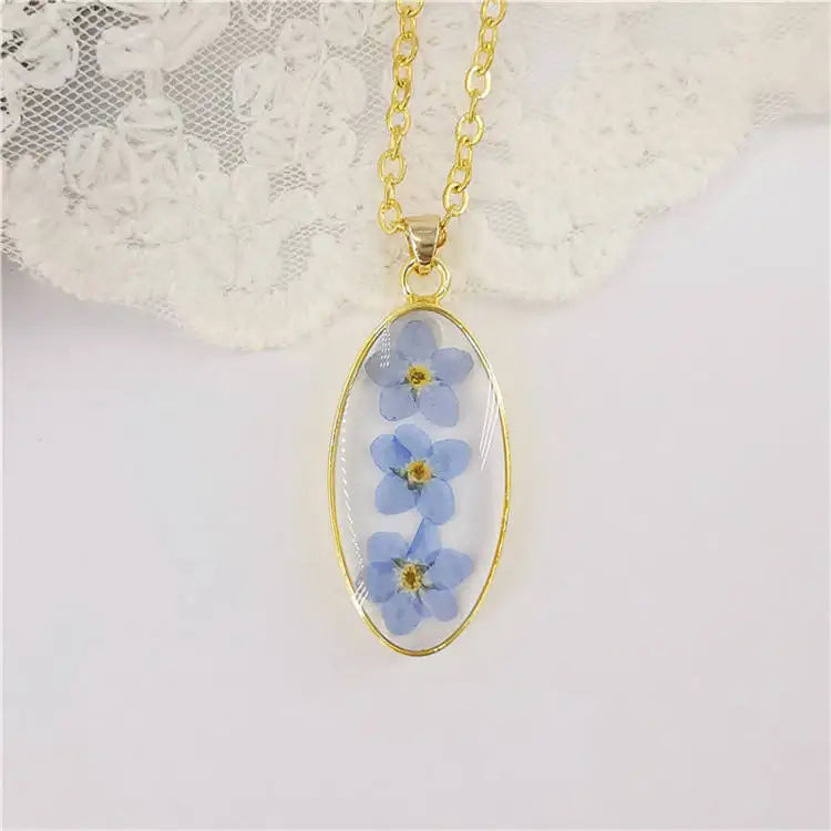 Classic Forget Me Not Pressed Flower Gold Plated Necklace Epoxy Resin Flower Oval Pendant Necklace