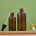 Wholesale Empty Amber 30ml Essential Oil Aroma Oil Perfume Glass Bottle with Dropper and Customizable Printing
