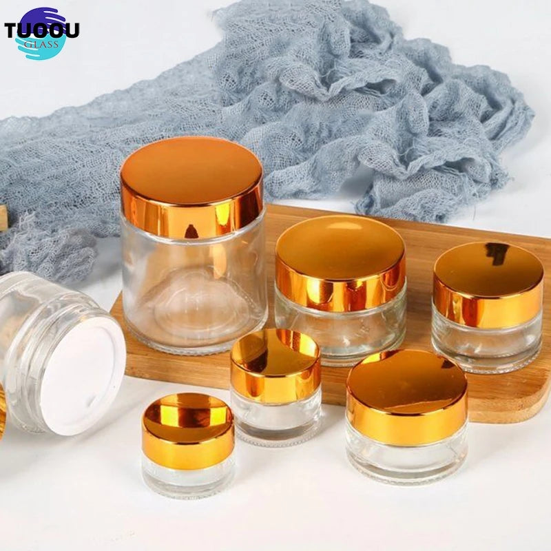 In Stock Wholesale 5G 10G 15G 50G Clear Amber Blue Green Matte Frosted Gold Lid Coloured Round Pots Glass Cosmetic Cream Jars