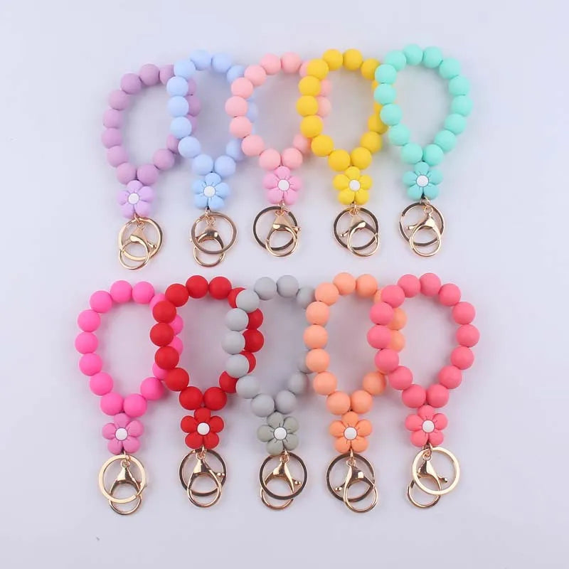 Factory Custom New Creative Flower Charm Bracelet Solid Color Silicone Beads Wristlet Keychain for Women