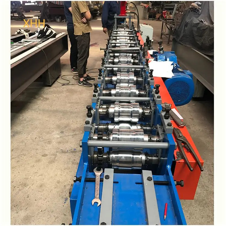 Full-automatic PLC-Controlled Gear Motor Bearing Steel Coil Shutter Slat Roll Form Profile Making Metal Folding Door Frame