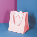 Colorful Design Printing logo Handle Bag Custom Paper Packaging Bag With Silk Ribbon Handle Rope Shopping Paper Bag
