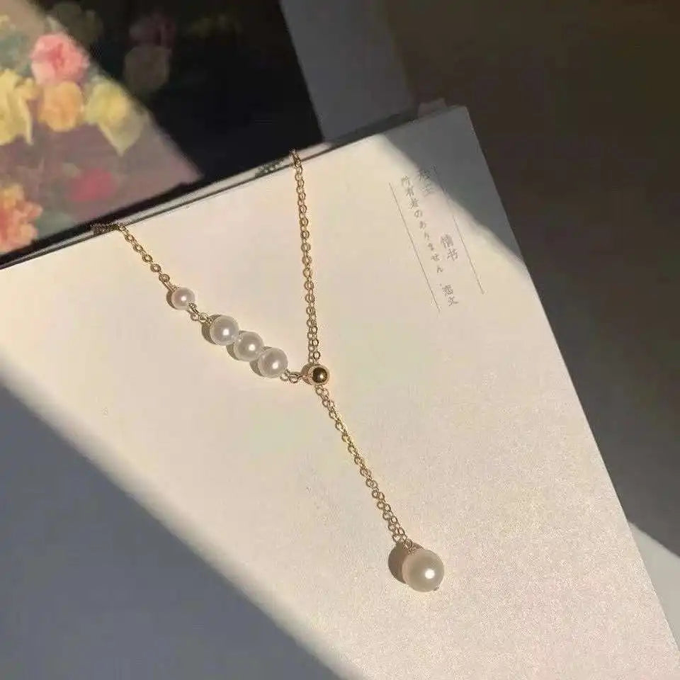 French Vintage Elegant Y-Shaped Natural Pearl Necklace 3-8mm New Product Special Offer in Pearl Jewelry