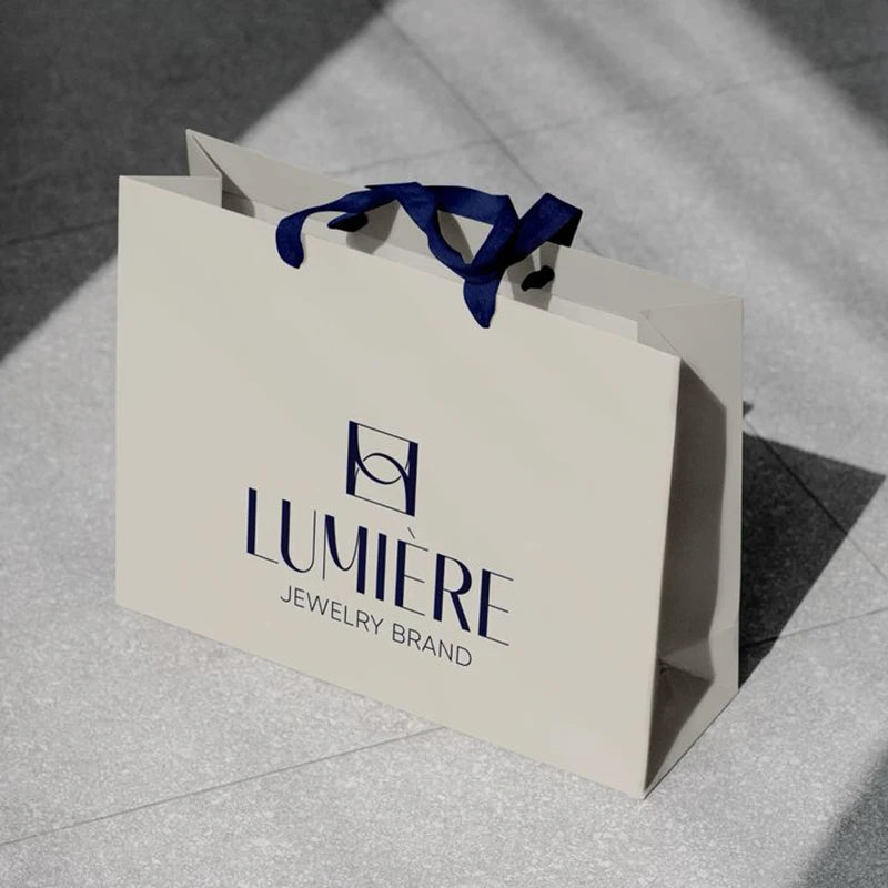 Custom Recycled Ivory Clothes Packaging Gift Bag With Ribbon Handle Luxury Cream Beige Shopping Paper Bags With Your Own Logo
