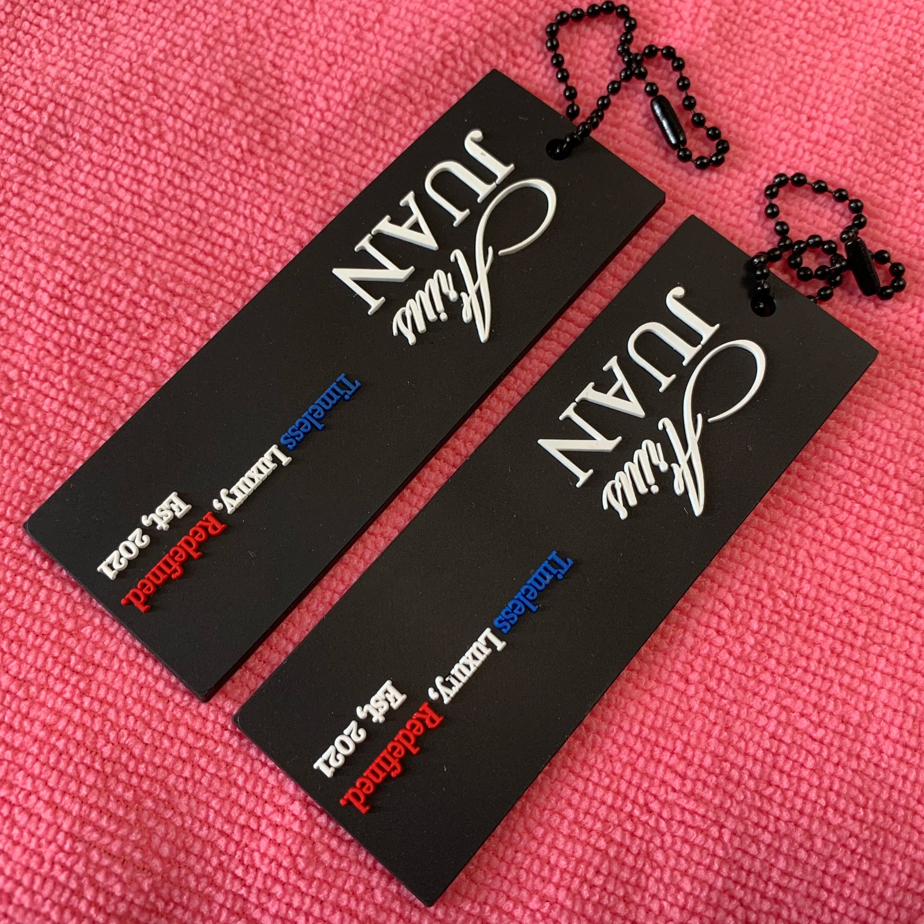 Frost Surface 3D Raised logo Black Silicone Rubber Hangtaghigh Flexible Apparel Convex logo PVC Rubber Clothing Tag