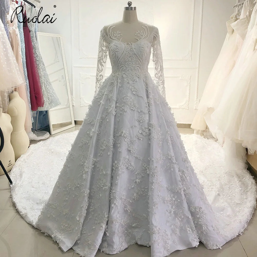 Ruolai ZW00251 Luxury Heavy Beaded Scoop Wedding Dresses Illusion Long Sleeve Cathedral Train Bridal Gowns
