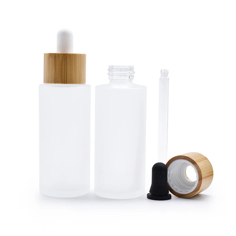 Good Price 15ml-100ml Flat Shoulder Round Bamboo Packaging Glass Oil Dropper Bottle