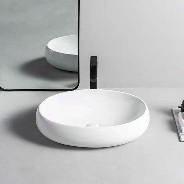 Luxury Hotel Sanitary Ware Servizi Igienici Oval Shape Washbasin Counter Top Ceramic Bathroom Sinks