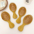 Hotel Travel Mini Bamboo Wood Laser Comb Cushion Massage Hair Brush Paddle Detangle Anti-static Air Brush for Hair Home