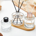Wholesale Round Glass Diffuser Bottle Empty Transparent Glass Fragrance Reed Aromatherapy Bottle