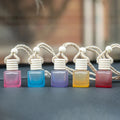 Hot Selling 8ml Square Frosted Colored Car Perfume Bottle Flat Shape with Wooden Caps Ropes Hanging Car Glass Perfume Bottles