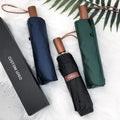 Custom Logo Printed 8-Ribs Golden Aluminum Frame Windproof 3-Folding Sun Rain Umbrella with Wood Handle for Travel