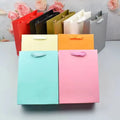 Own Brand High-End Luxury Kraft Paper Handbag High-Class Gift Packaging for Clothing Promotion with Digital Printing