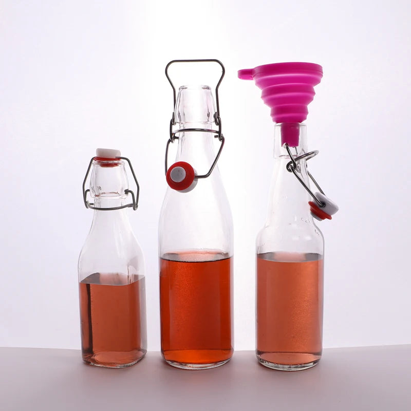 Round Shape Stocked 16 oz clear Glass Swing Top Bottles with Flip Top Cap for Juice and Beverage