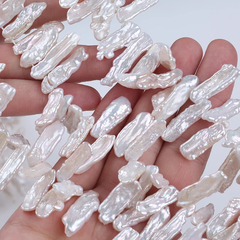 Zhuji Pearl Wholesale 6-8mm Natural White Biwa Shape Loose Freshwater Pearls for Jewelry Making Stand Included