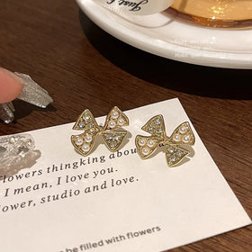 Wholesale Cheap Price 925 Silver Ear Acupuncture Earrings Womens Gold Earrings Unique Skew Symmetric Design Bow Stud Earrings