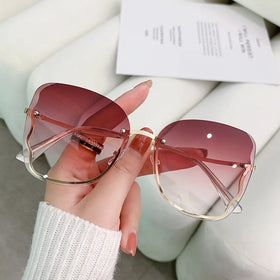 2026 Designers Sun Glasses Unisex Rose Gold Custom Sunglasses Uv400 Protection Colorful Butterfly Metal Frameless Sunglasses