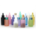 Hot Sales Frosted 10ml 20ml 100ml 50ml 30ml Glass Dropper Bottles in Pink Clear for Oil with Pump Sprayer Sealing Type
