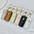 Alloy Leopard Print Keychain Metal Rivet Lipstick Bag Pendant PU Leather Rechargeable Feature Small Doll Mobile Phone Bag Gift