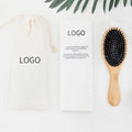 2026 Custom Logo Natural Bamboo Wood Extension Hair Brush Boar Bristle Wig Hair Brush with Paddle Feature New Design