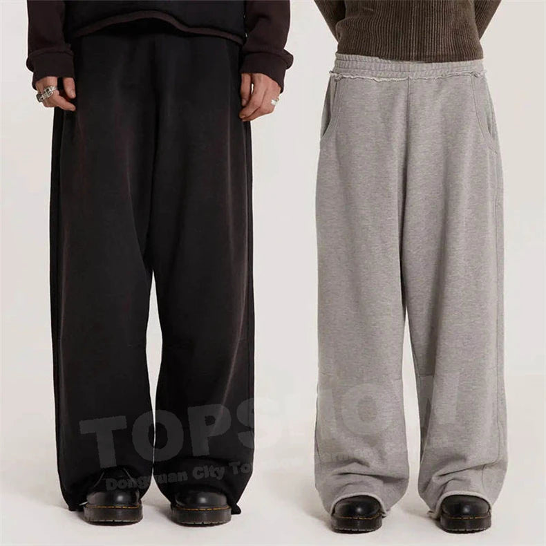 Oem Factory Customized Oversized Heavyweight Sweatpants Men Solid Color Raw Hem Elastic Waist Relaxed Sweatpants Wide Leg Pants