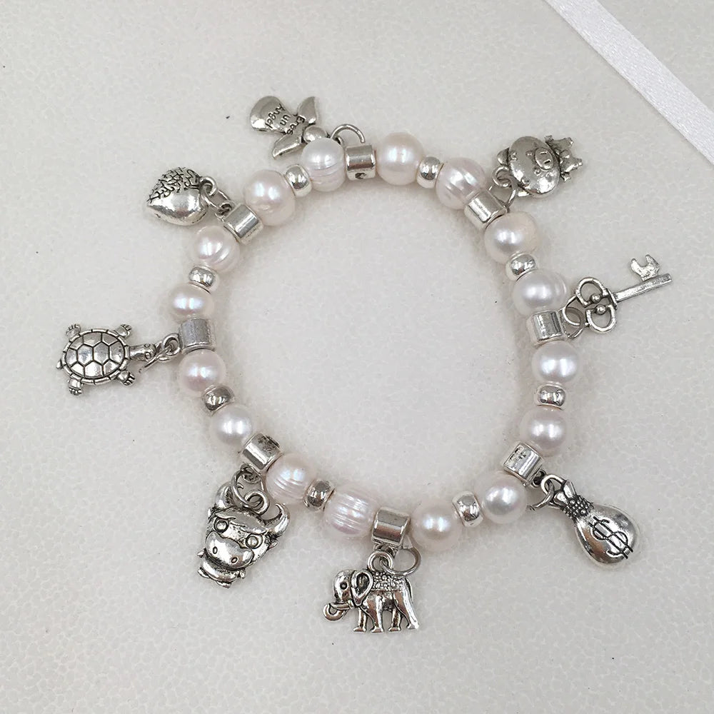 7 mm  Near Round  Pearl Bracelet  and Nice Charm.turtleelephantheart Cowkey 100% Freshwater Pearl Bracelet