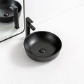 OEM ODM Luxury Matte Black Ceramic Sink Bathroom Hotel Above Counter Art Wash Basin Round Washbasin