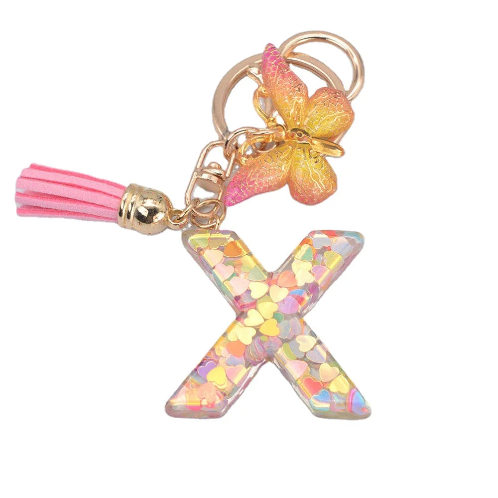 Good Quality and Price Clear Plastic Acrylic Epoxy Resin Acetate 26 Letter Keychain With Butterfly Charm and Tassel