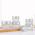 Wholesale Empty 30g 50g Frosted Glass Cosmetic Cream Jars with Plastic Lids for Skin Care Cream & Lotion