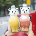 Wholesale 700ml Transparent Bear Panda shape PET Bottle for juice milk boba tea