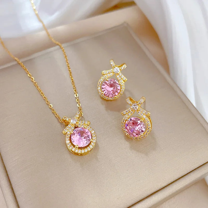 Wholesale 18k Gold Plated Stainless Steel CZ Bowknot Pink Round Cut Zircon Pendant Necklace and Earring Jewelry Set for Women