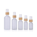 In Stock5ml 10ml 15ml 20ml 30ml 50ml 100ml Frosted/amber/blue/green Glass Essential Oil Spray Bottle With Real Bamboo Spray Top
