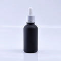 Face Oil Packaging 50ml Serum Glass Bottle 30ml 100ml Matte Black Round Essential Oil Glass Dropper Bottle