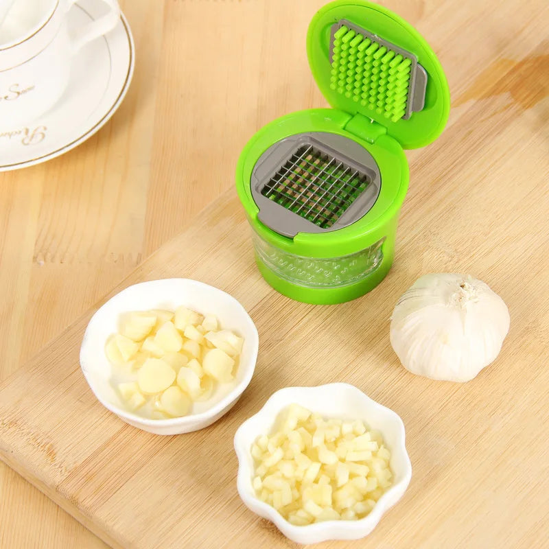 Stainless Steel Onion Pressing Grater Cutter Tool Garlic Crusher Squeezer and Slicer Manual Garlic Chopper Grinder Kitchen Tool