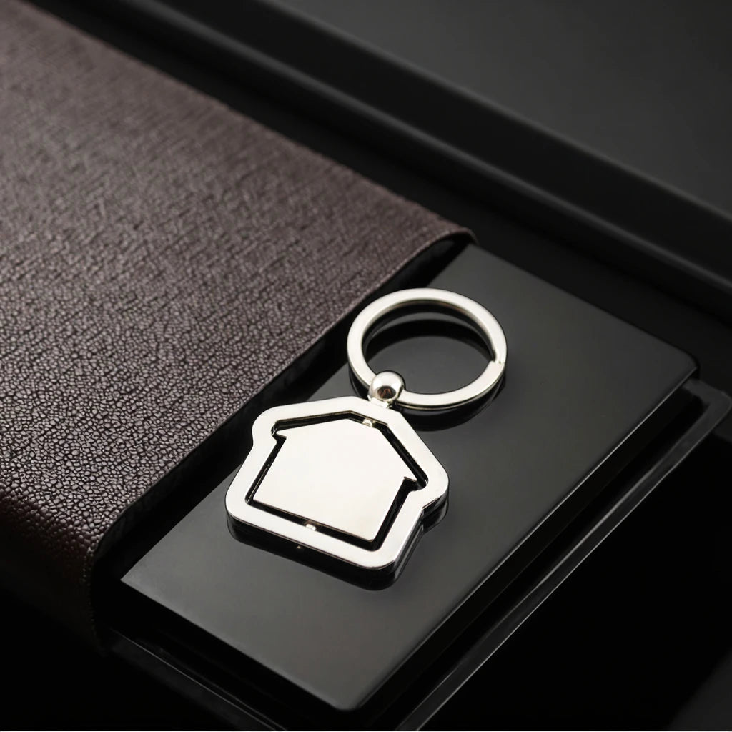 Silver Custom Metal Keychain Laser Polished and Engraved Rotatable Swirling House Shaped Cute Keyring