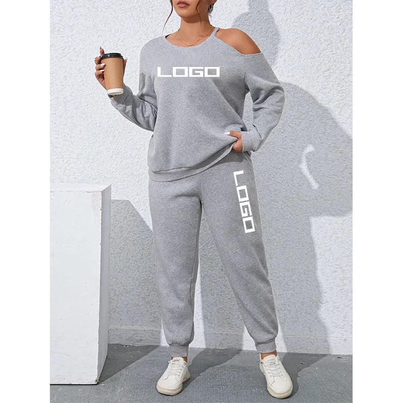 F240030 Custom Printed Embroidery Logo One-Shoulder Opening Asymmetric Sweatshirt Sweatpants Joggers Women Hoodie Tracksuit Set
