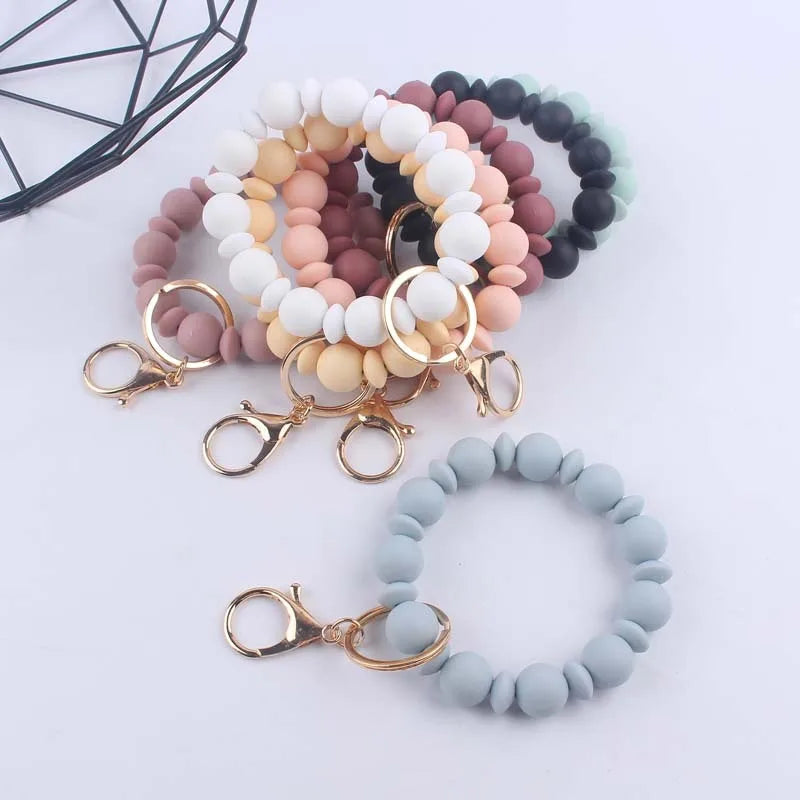 Custom Elastic Silicone Beads Bangle Bracelet Keychain PU Leather Tassel Wristlet with Doll Pattern Safe Feature