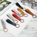 Customized Logo Fashion PU Leather Keychain Business Gift Leather Key Chain Men Women Car Key Strap Waist Wallet Keyrings